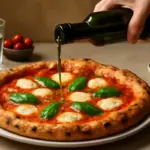 Olio aromatizzato sulla pizza: il modo corretto di usarlo per esaltare il sapore senza coprirlo